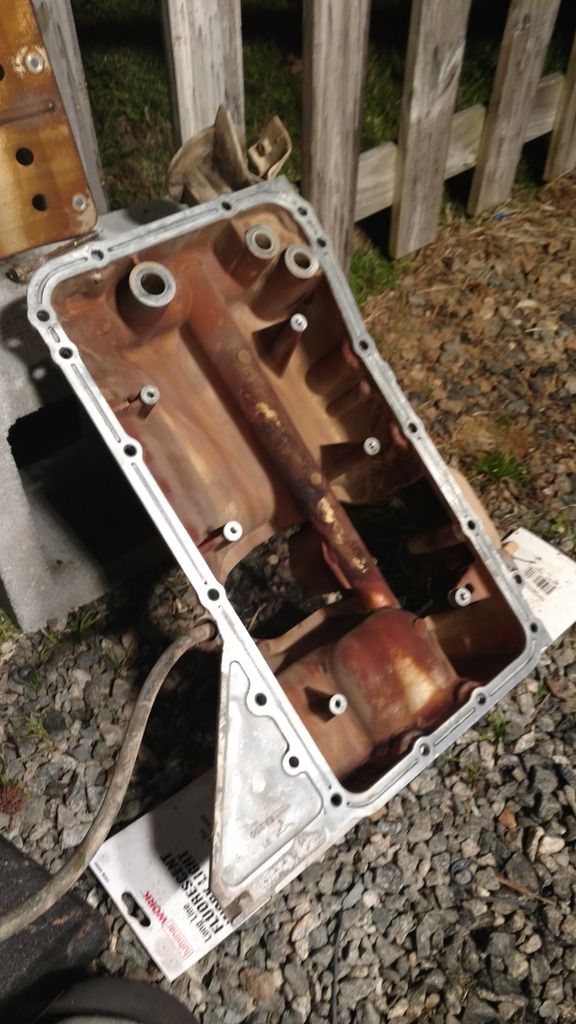 Dropped Lower Oil Pan, White RTVlike Pieces found Inside Second